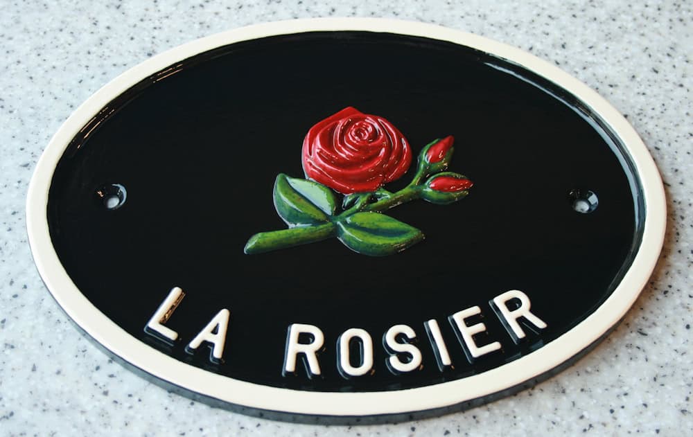 rose motif house sign